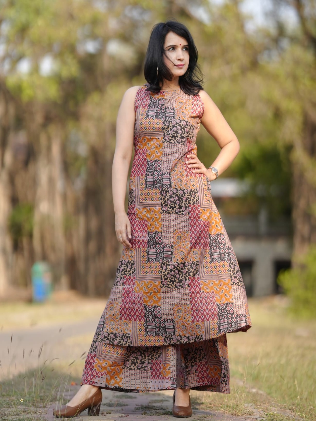 

KALINI Geometric Printed Round Neck A-Line Kurta With Palazzos, Brown