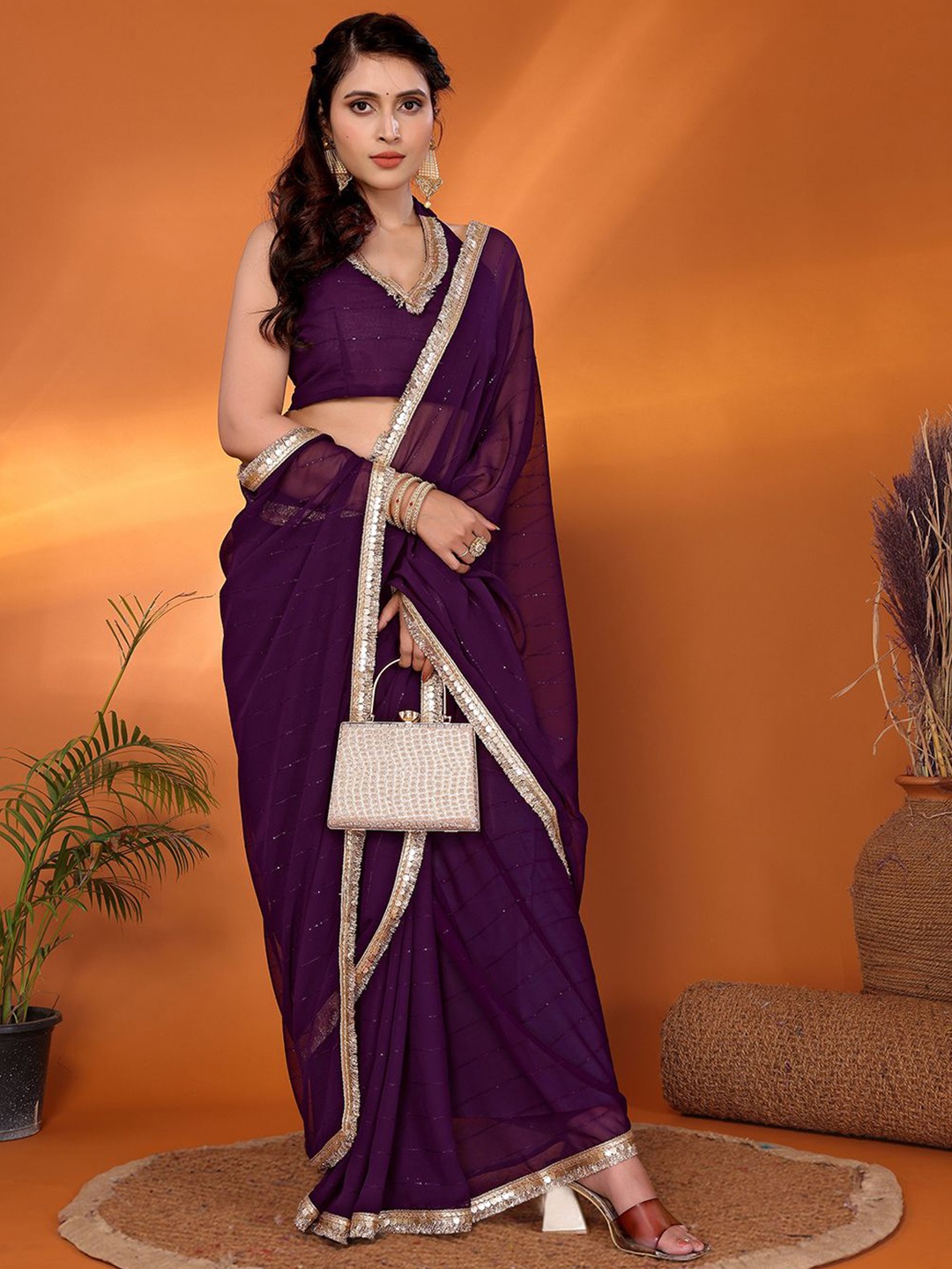 

FABMORA Sequinned Pure Georgette Saree, Purple