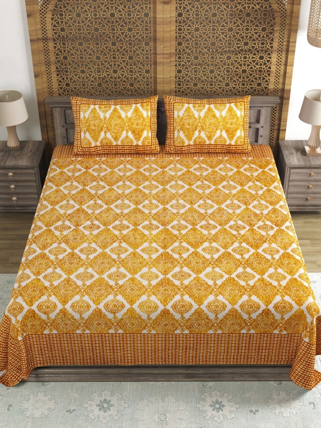 

Myntra Elegant Homes Yellow Motifs Printed Cotton 144TC King Bedsheet Set-2.18 m x 2.64 m