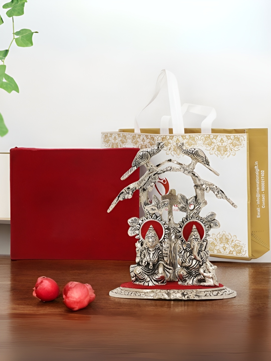 

INTERNATIONAL GIFT Silver-Toned Lord Ganesha Religious Idol Showpiece