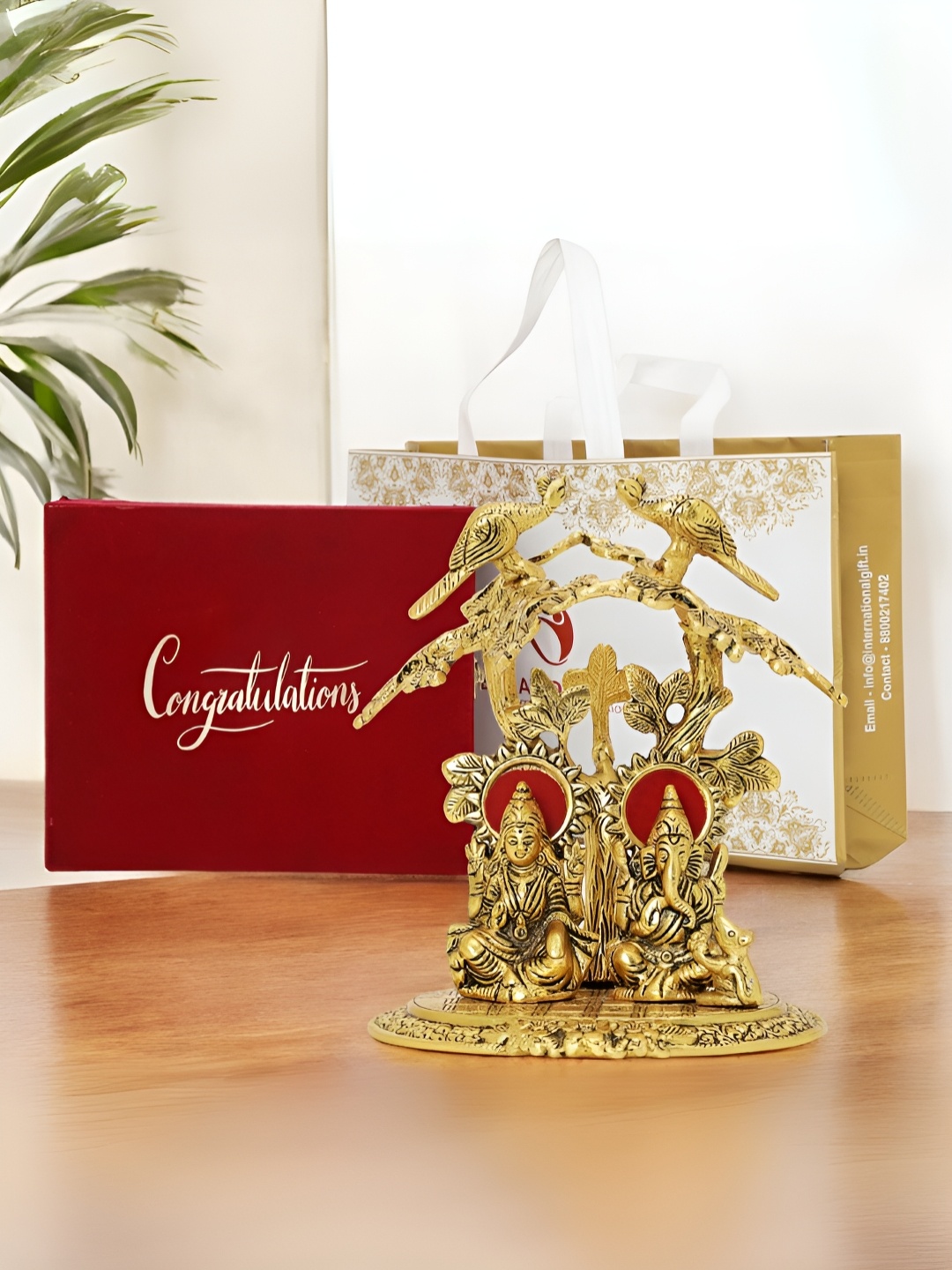 

INTERNATIONAL GIFT Gold -Toned Lord Ganesha & Goddess Laxmi Religious Idol Showpiece