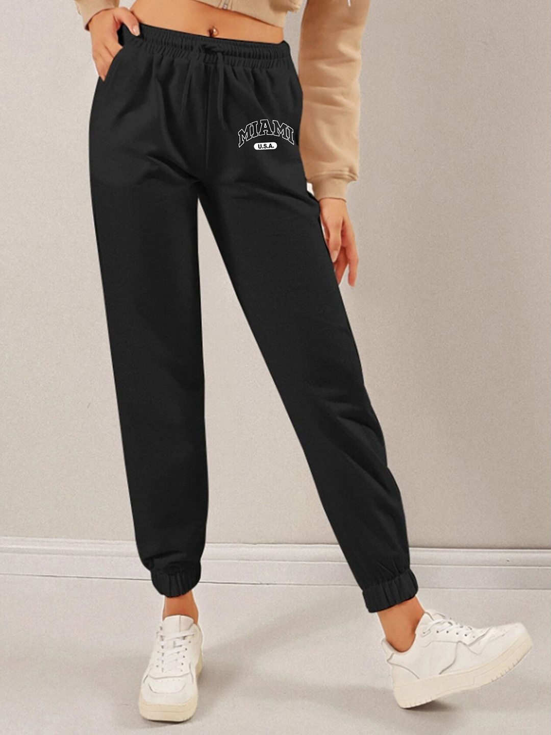 

SAAHASAM Women Printed Relaxed Slim Fit Joggers, Black