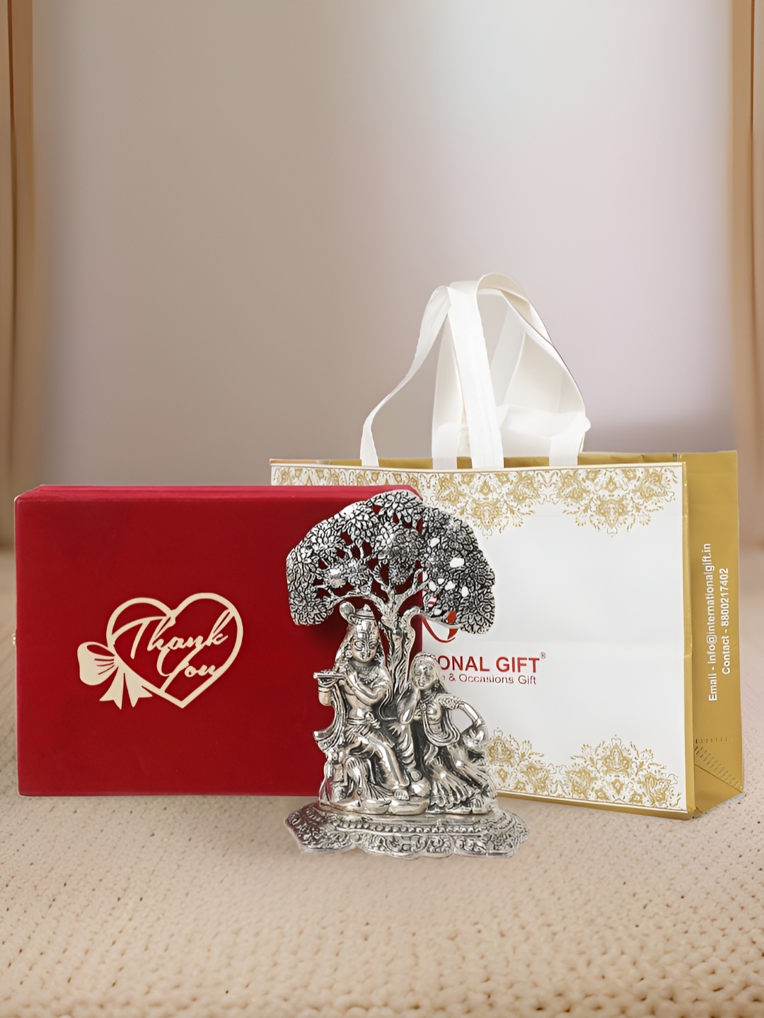 

INTERNATIONAL GIFT Silver-Toned Radha Krishna Religious Idol Showpiece