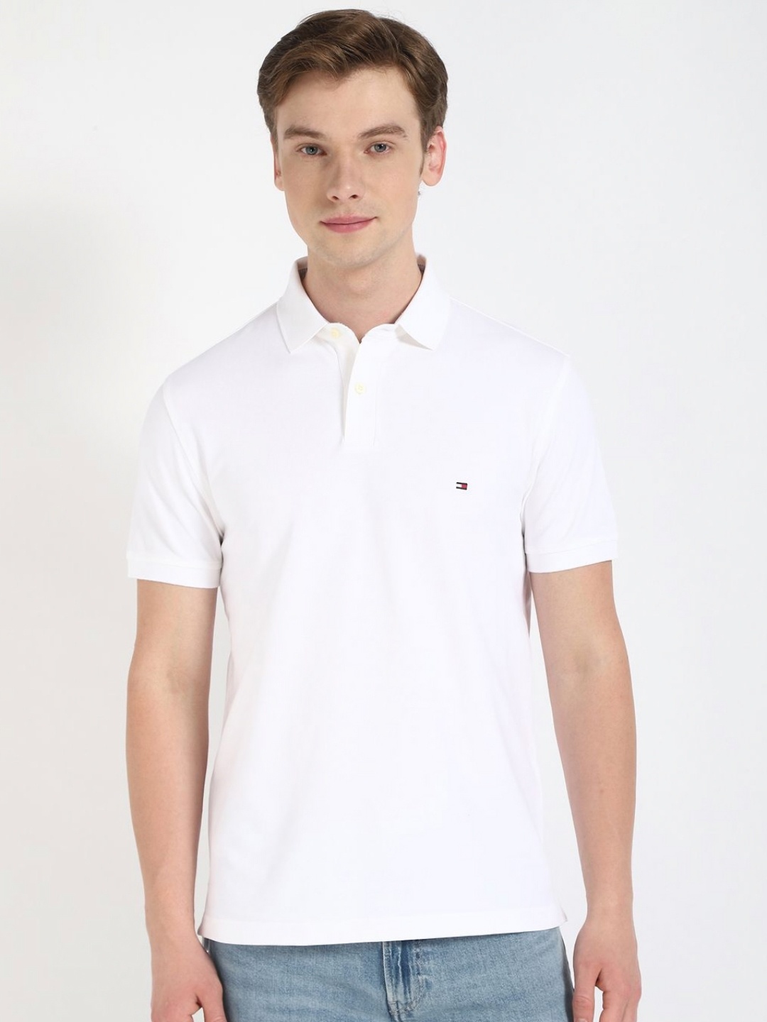 

Tommy Hilfiger Men Solid Polo Collar Cotton T-shirt, White