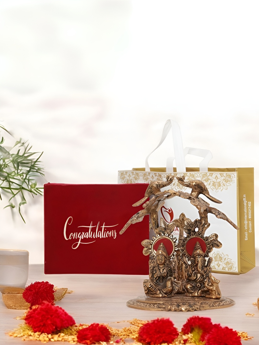 

INTERNATIONAL GIFT Brown Laxmi Ganesh Religious Idol Showpiece