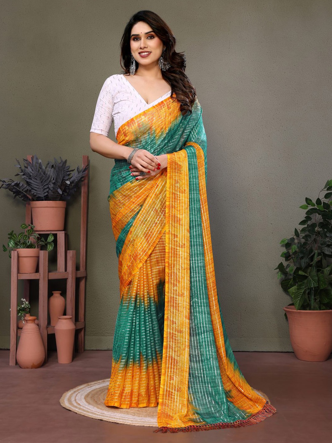 

DIVASTRI Striped Pure Georgette Saree, Green