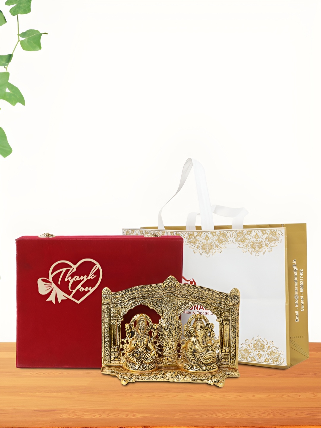 

INTERNATIONAL GIFT Occasional Gift Set Gold-Toned Lord Ganesha Religious Idol Showpiece