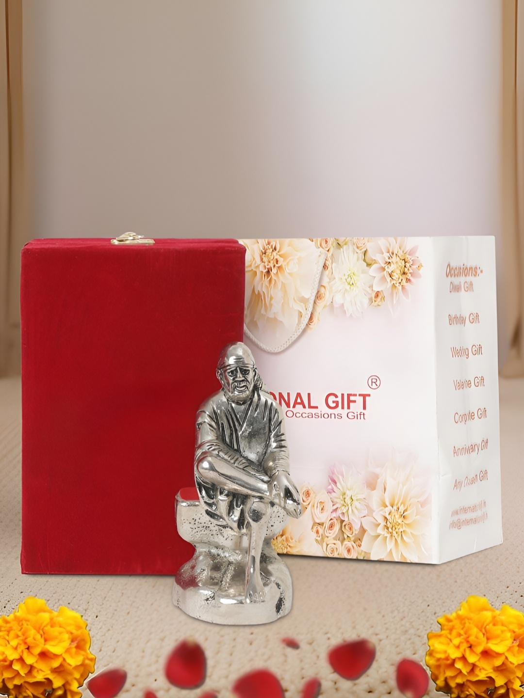

INTERNATIONAL GIFT Silver Plated Sai Baba Idol Gift Set with Velvet Box and Bag