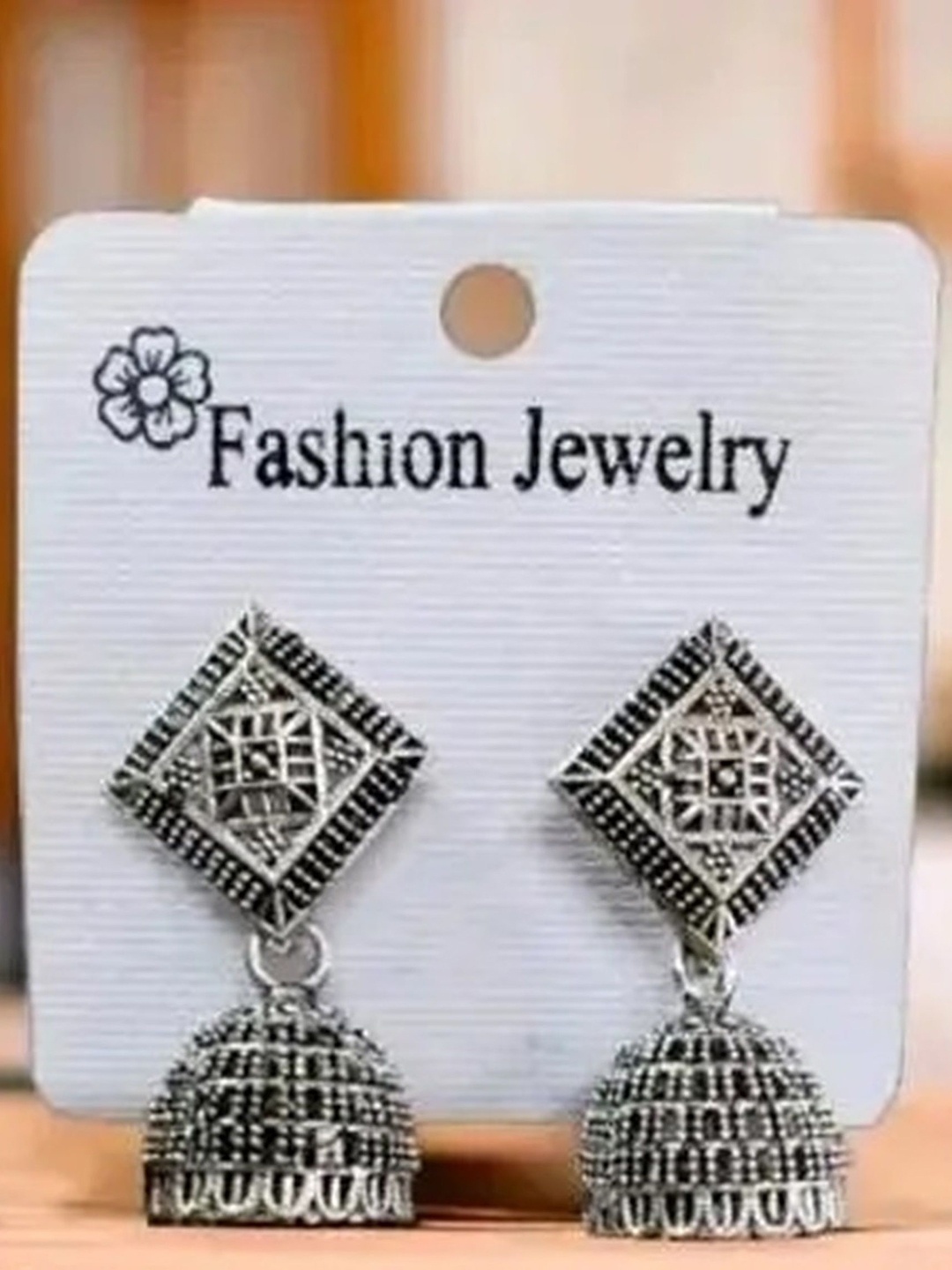 

TANLOOMS Classic Jhumkas Earrings, Silver