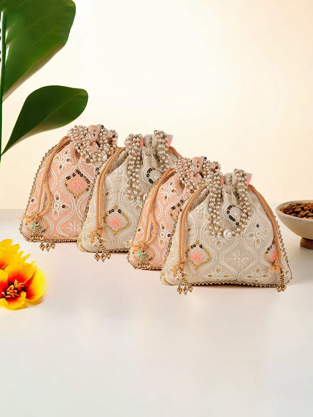 

Kuber Industries Cream & Peach 4 Pieces Pearl Embroidered Potli Clutchs