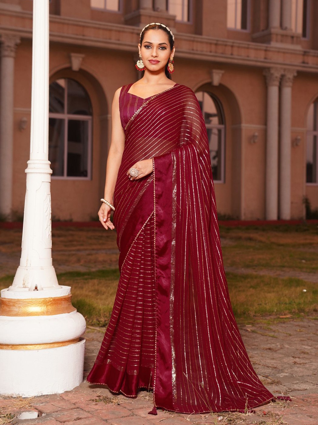 

KALINI Striped Gotta Patti Pure Georgette Heavy Work Saree, Maroon