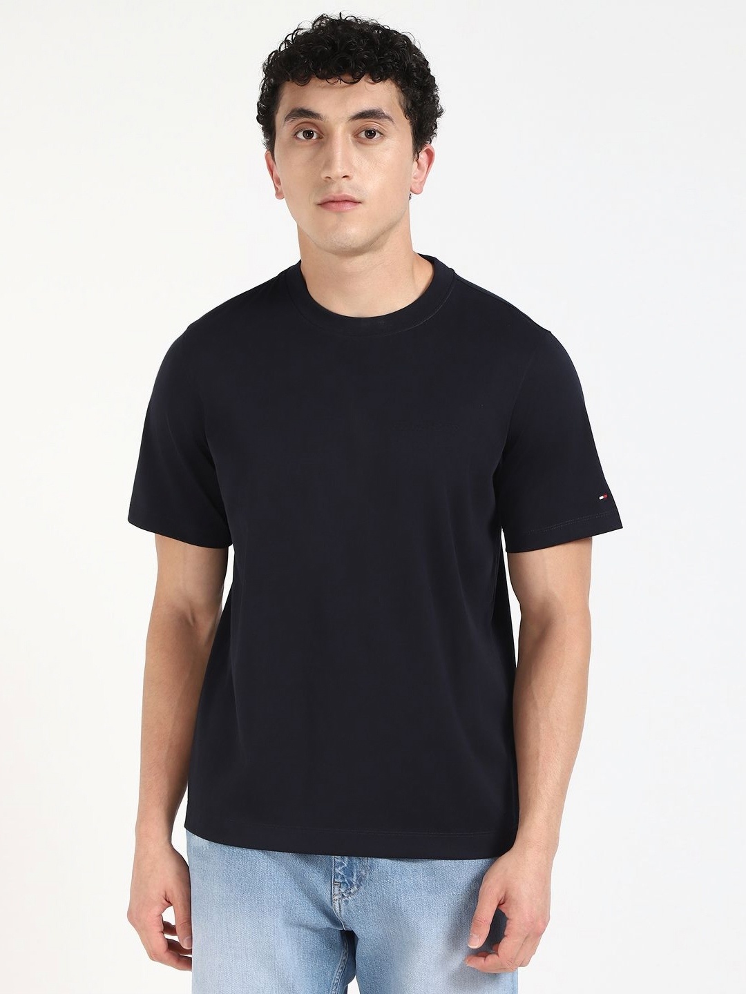 

Tommy Hilfiger Men Solid Round Neck Cotton T-shirt, Black