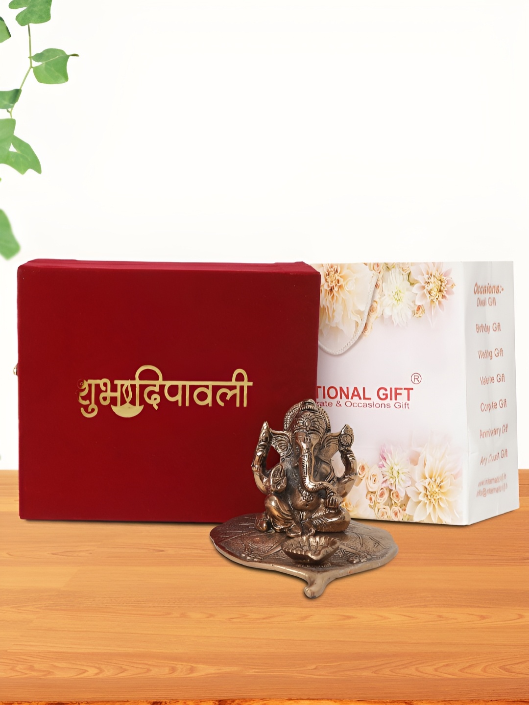 

INTERNATIONAL GIFT Brown Patta Ganesh Religious Idol Showpiece