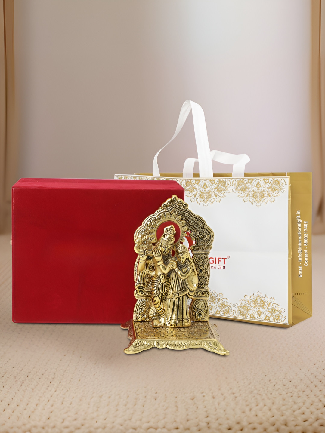 

INTERNATIONAL GIFT Gold-Toned God And Goddedd Radha Krishna Religious Idol Showpiece