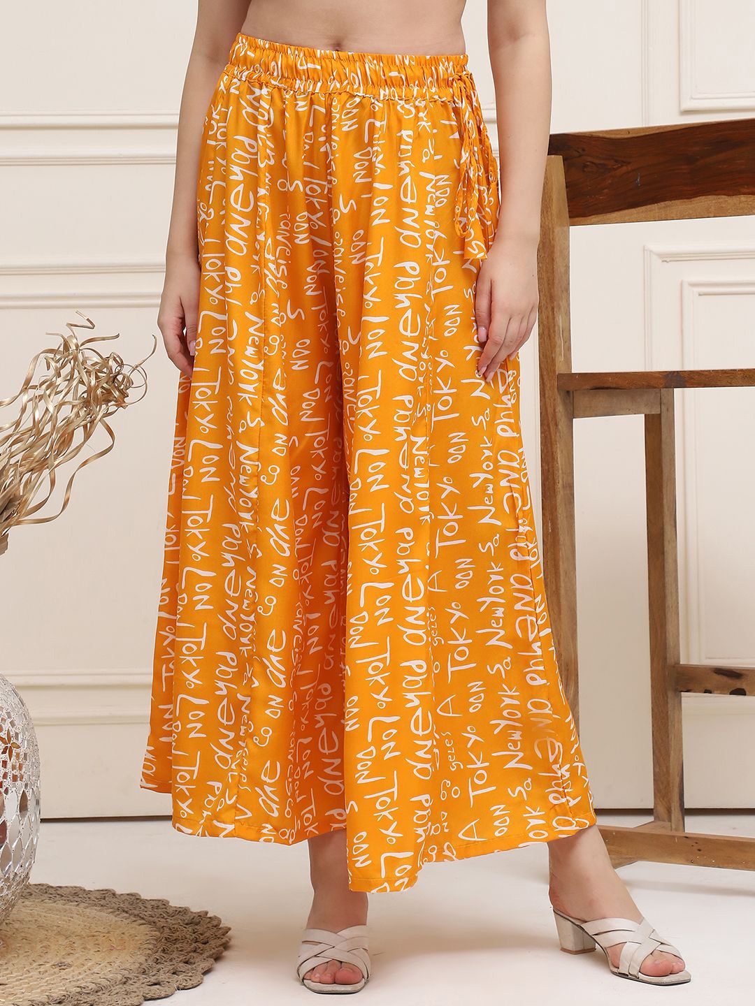 

Valles365 by S.C. Women Printed Flared Crepe Palazzos, Orange