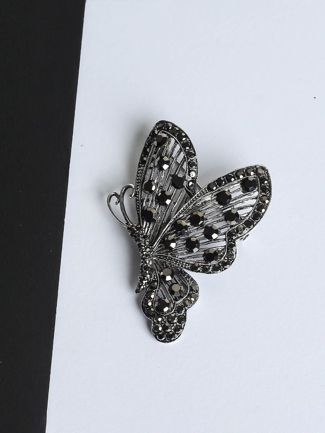

Tossido Men Stone Studded Butterfly Shaped Brooch, Black