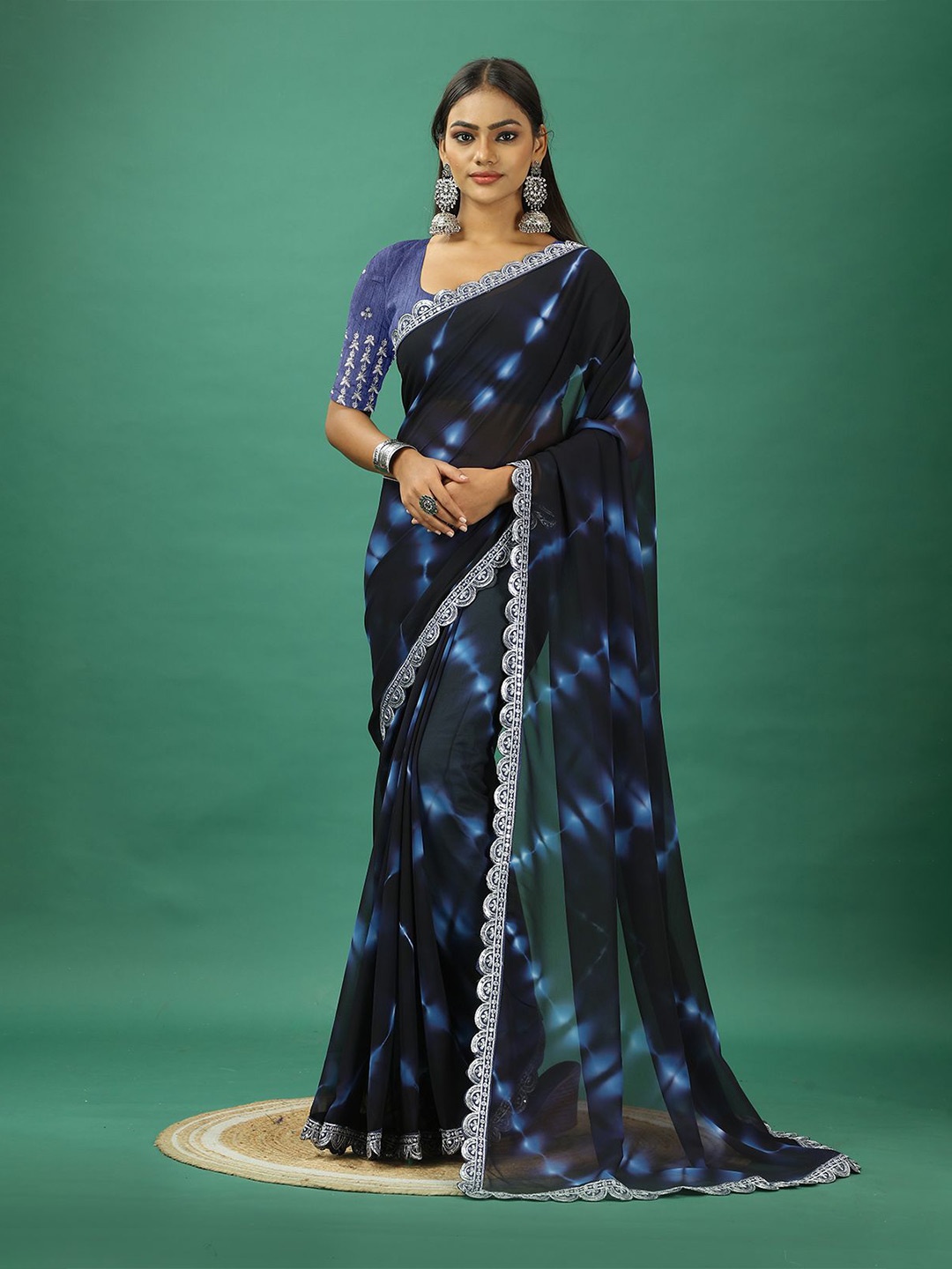 

NIRMAL CREATION Tie and Dye Mukaish Work Pure Georgette Saree, Black