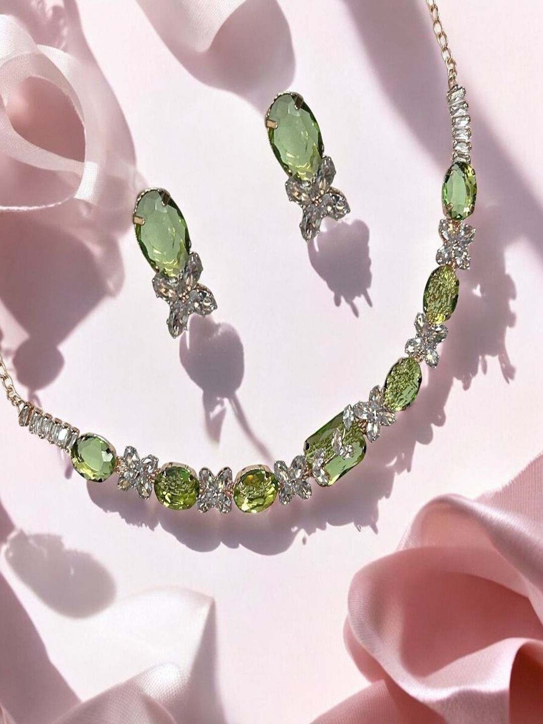 

AccessHer Silver-Plated American Diamond Studded Necklace and Earrings