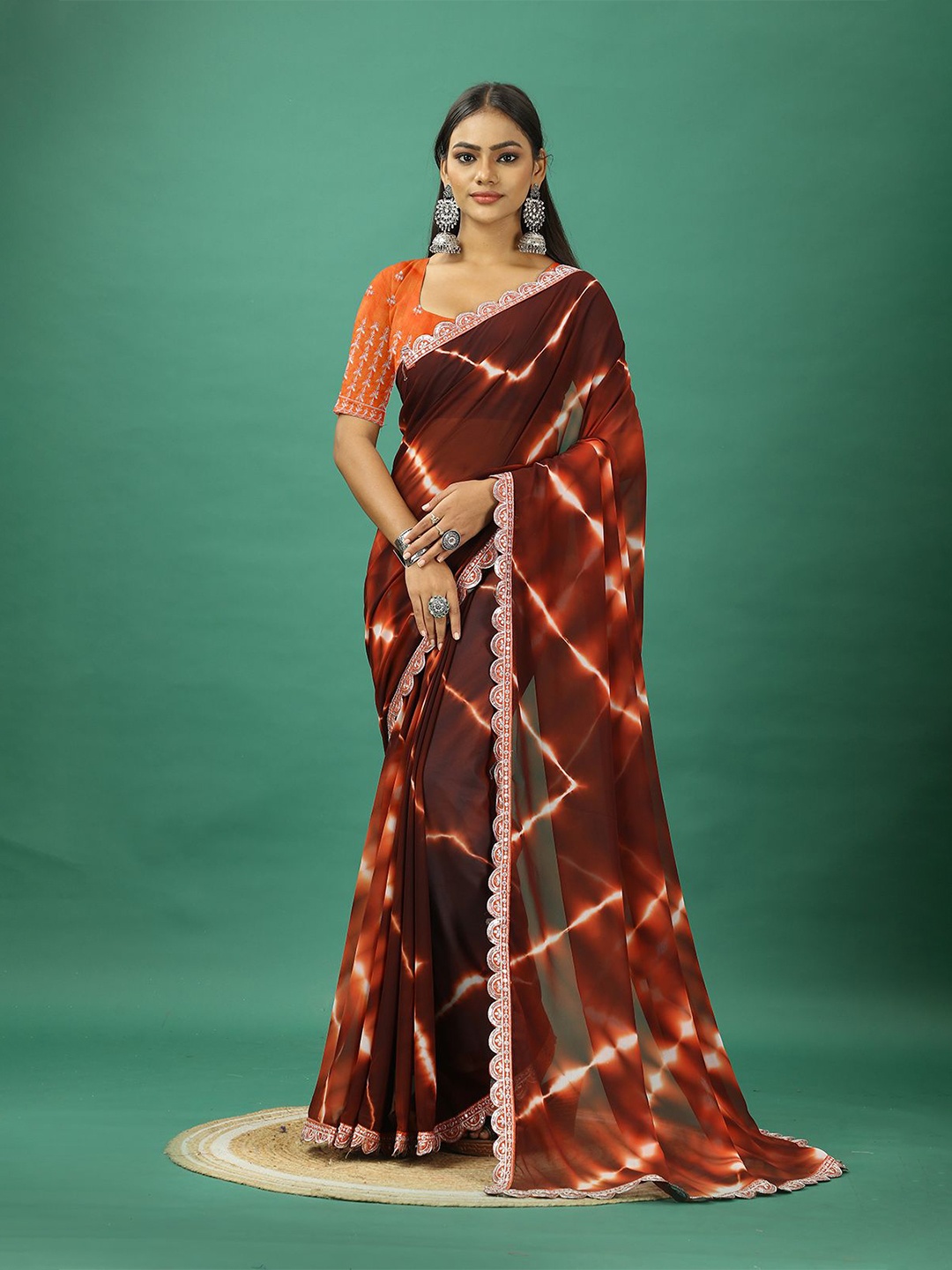 

A.V.M. SILK MILLS Tie and Dye Embroidered Pure Georgette Saree, Maroon