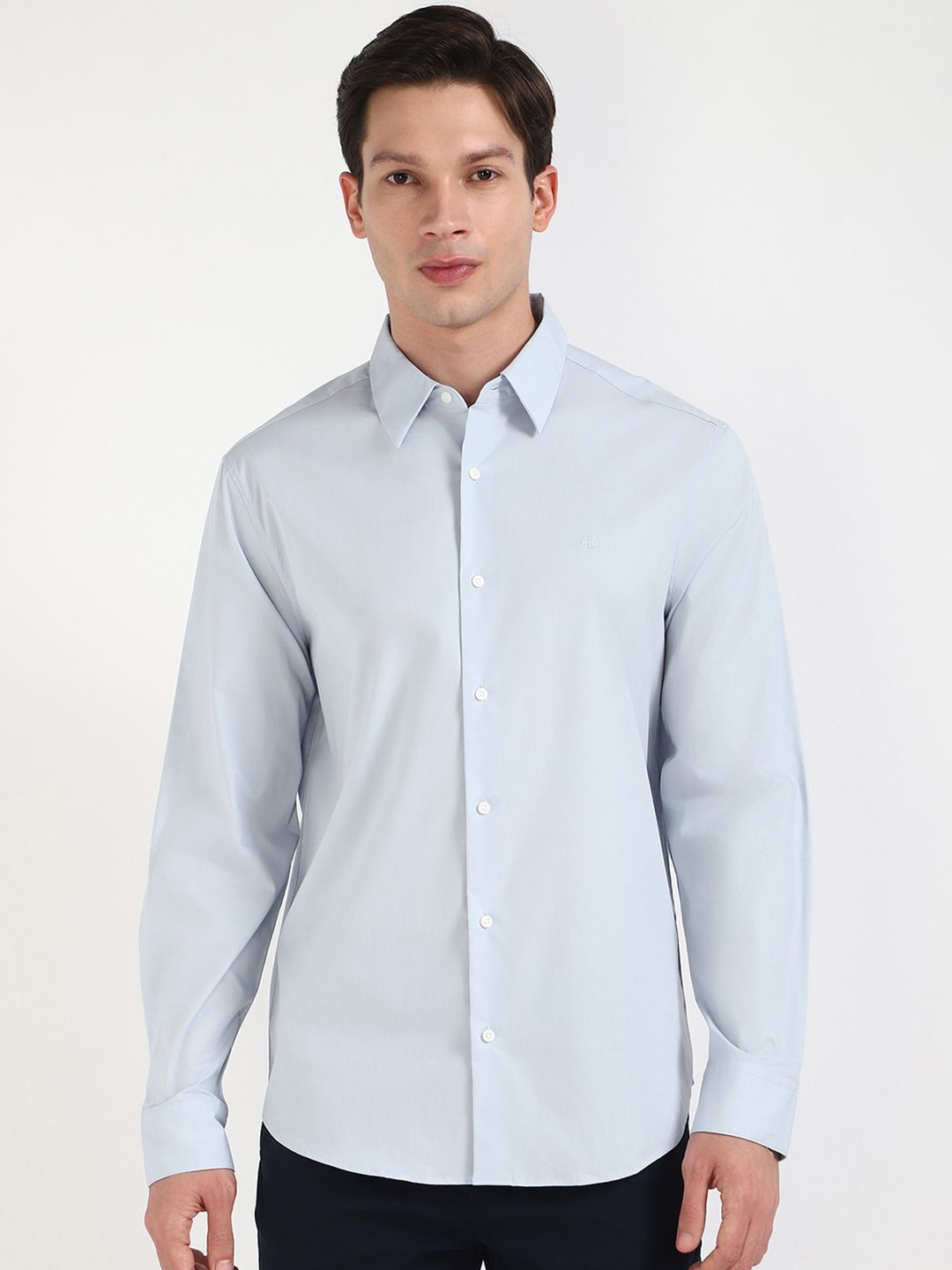 

Calvin Klein Jeans Men Spread Collar Solid Cotton Casual Shirt, Blue