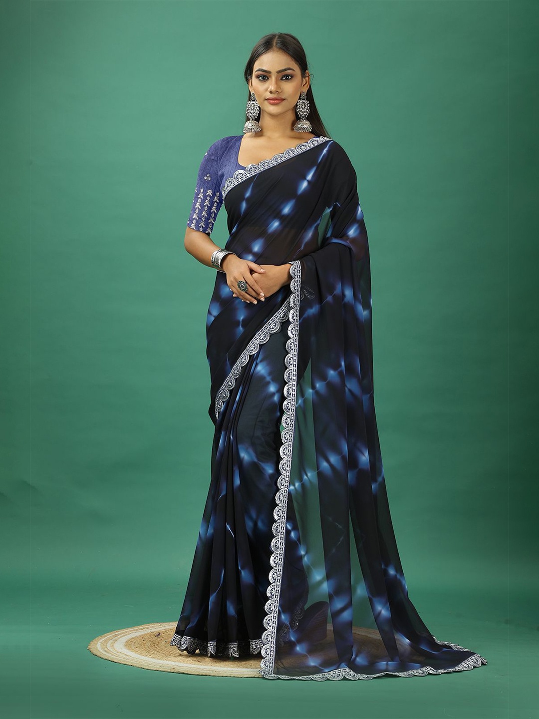 

A.V.M. SILK MILLS Tie and Dye Embroidered Pure Georgette Saree, Blue