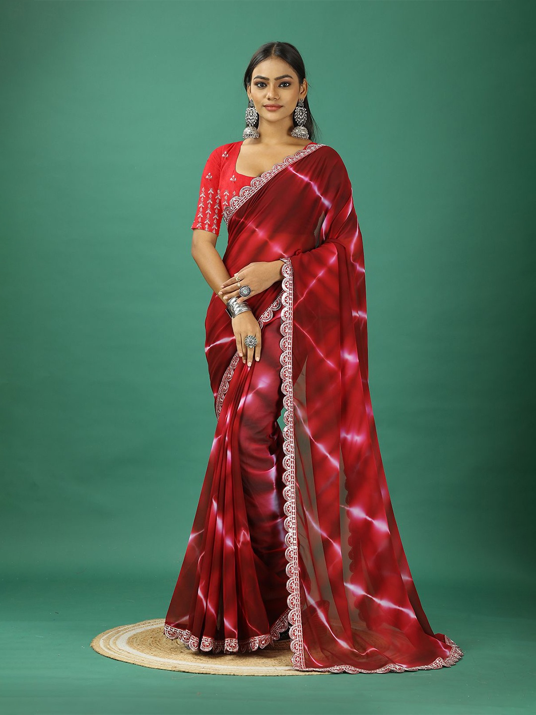 

A.V.M. SILK MILLS Tie and Dye Embroidered Pure Georgette Saree, Red