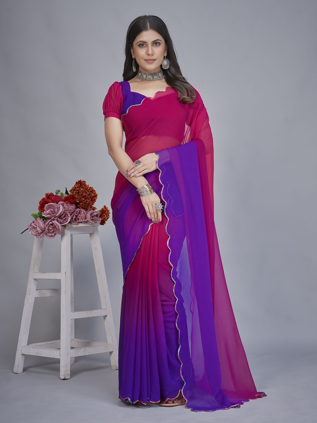 

A TO Z CART Colourblocked Pure Georgette Saree, Magenta