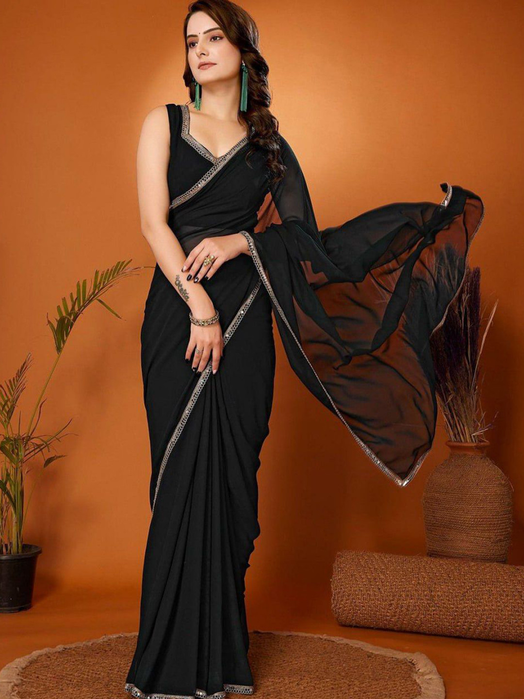 

BAESD Women Solid Pure Georgette Saree, Black