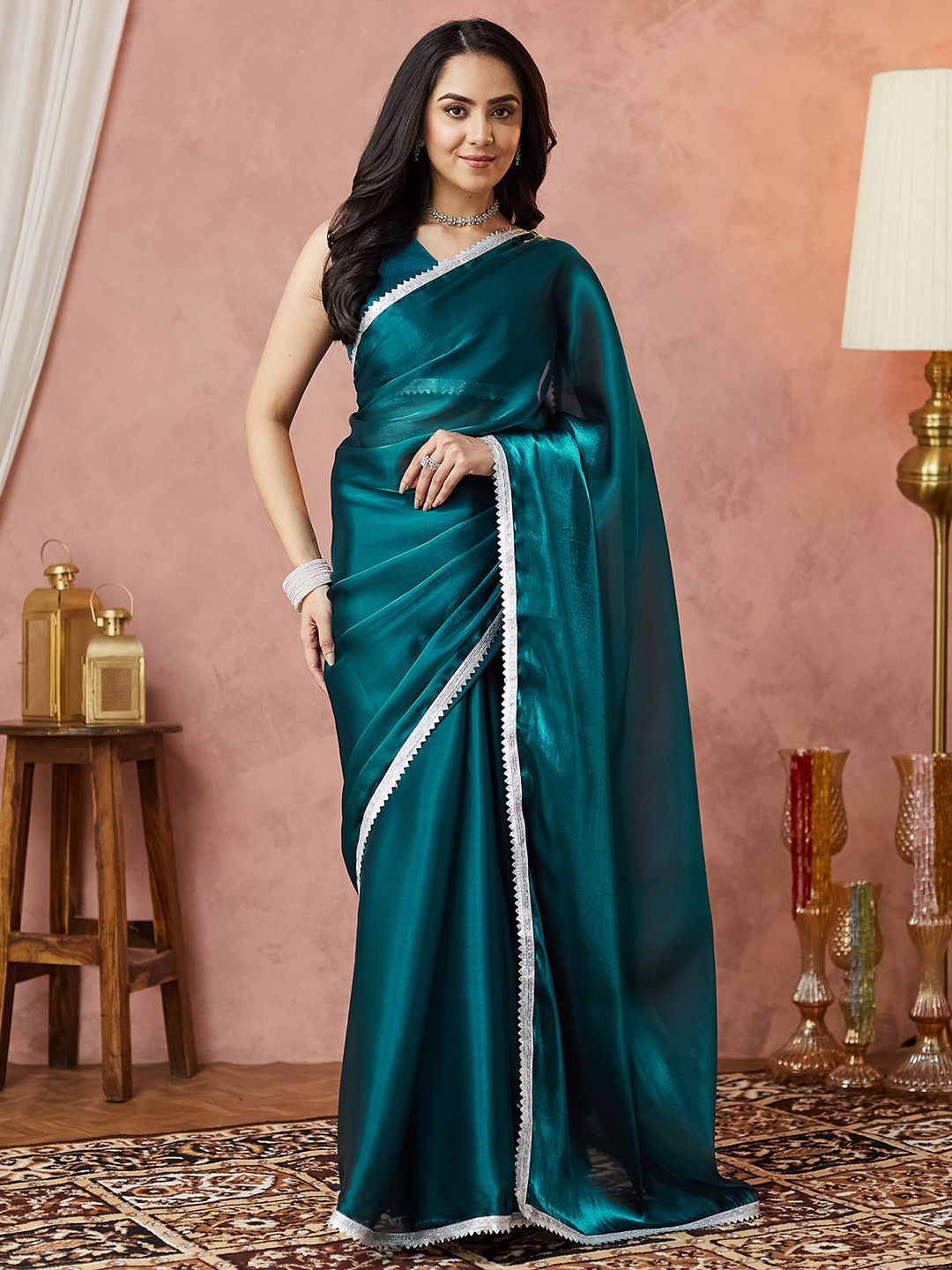 

Mitera Women Solid Tissue Saree, Teal