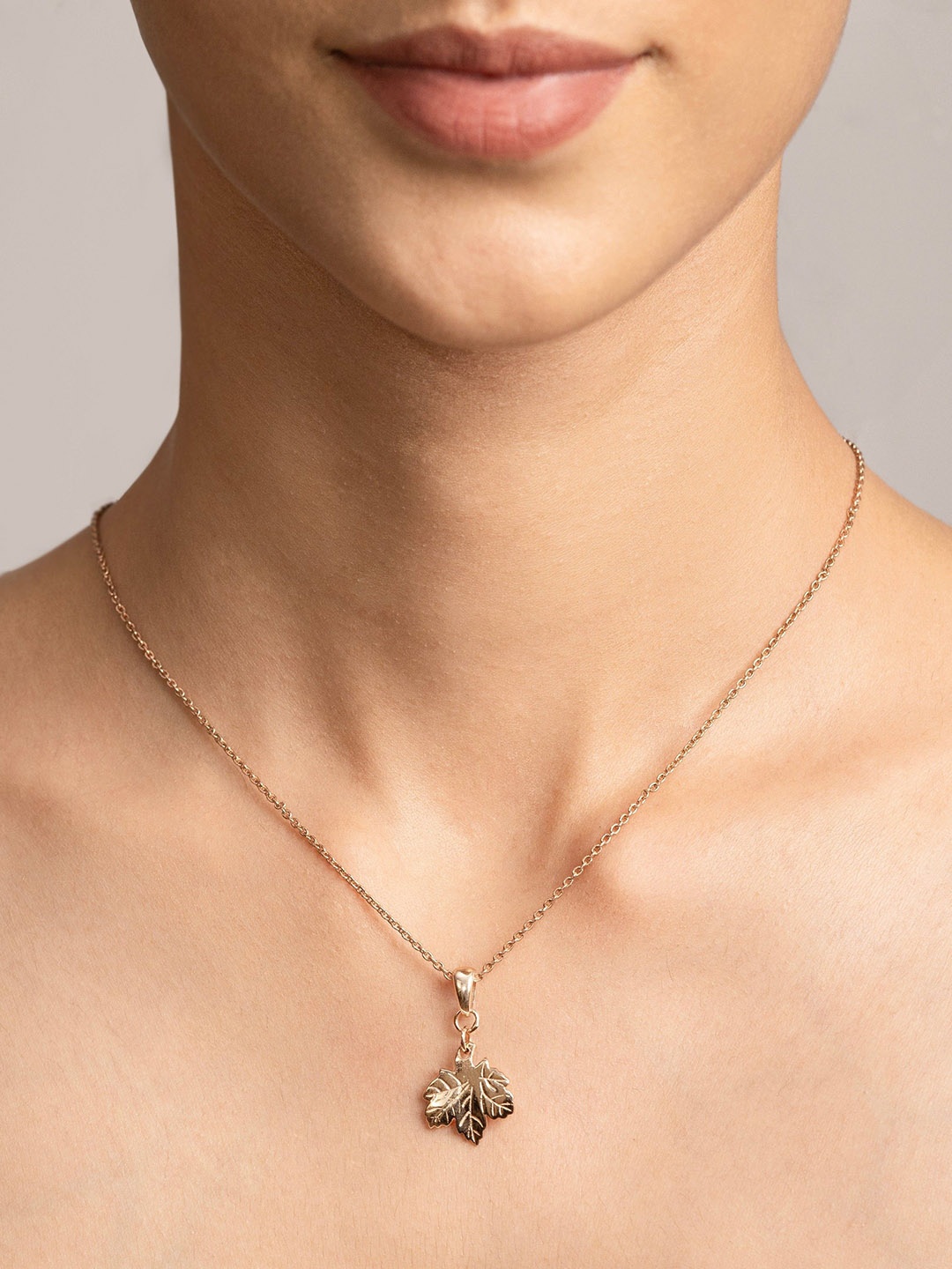

Ruhaani Sterling Silver Rose Gold-Plated Spring Leaf Whispers Pendant With Chain