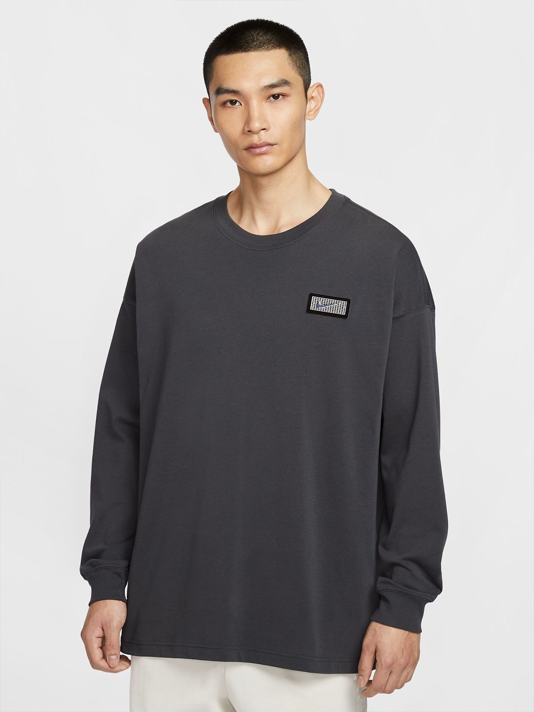 

Nike Men Printed Oversized Round Neck Drop-Shoulder Cotton Sport T-shirt, Black