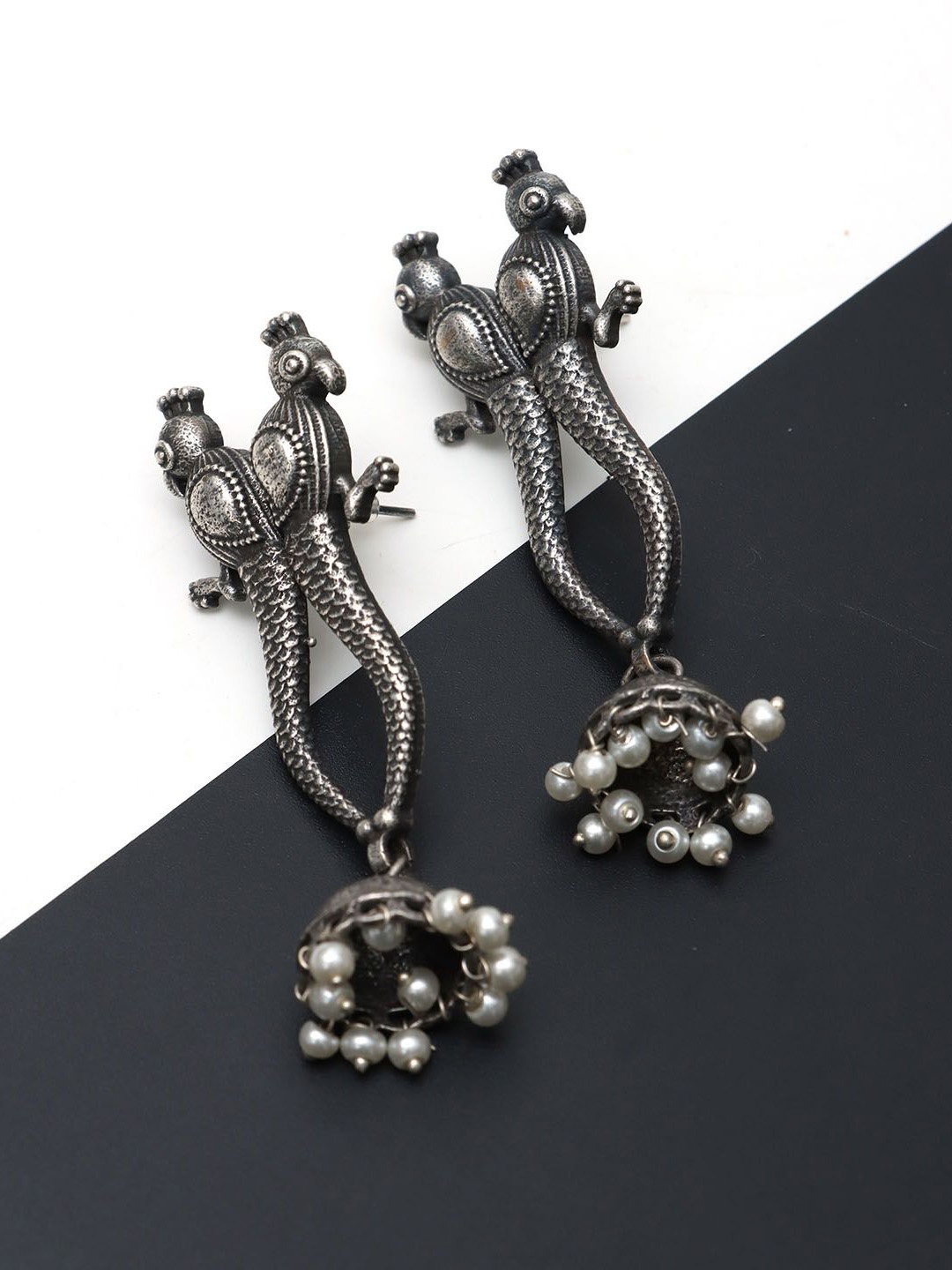 

Ozanoo Pearls Studded Peacock Shaped Jhumkas, Silver