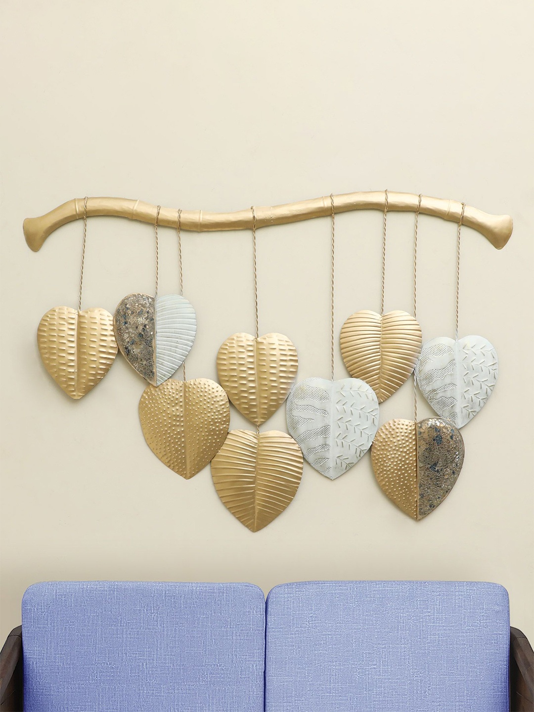 

vedas Mystic Indiana Gold-Toned & White Textured Metal Betel Leaf Wall Decor