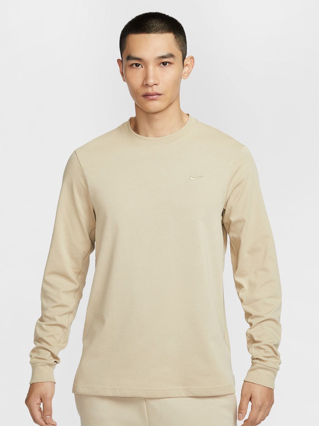 

Nike Men Dri-FIT Solid Round Neck Cotton Sport T-shirt, Beige