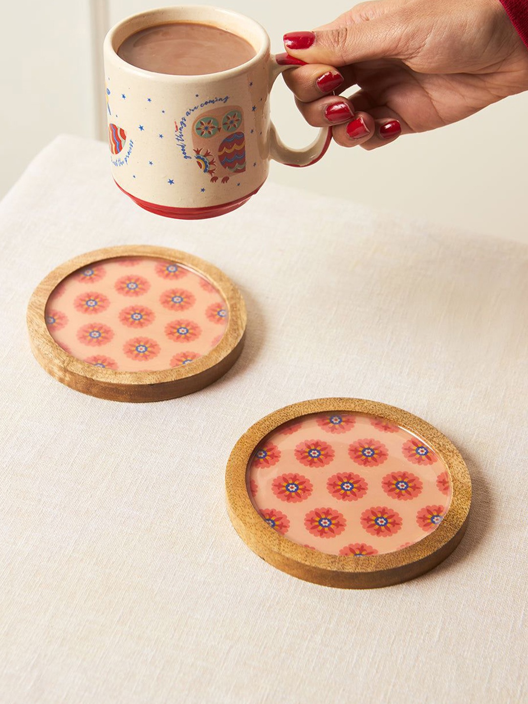 

Chumbak Brown & Peach-Colored 2 Pieces Printed Wooden Round Coasters