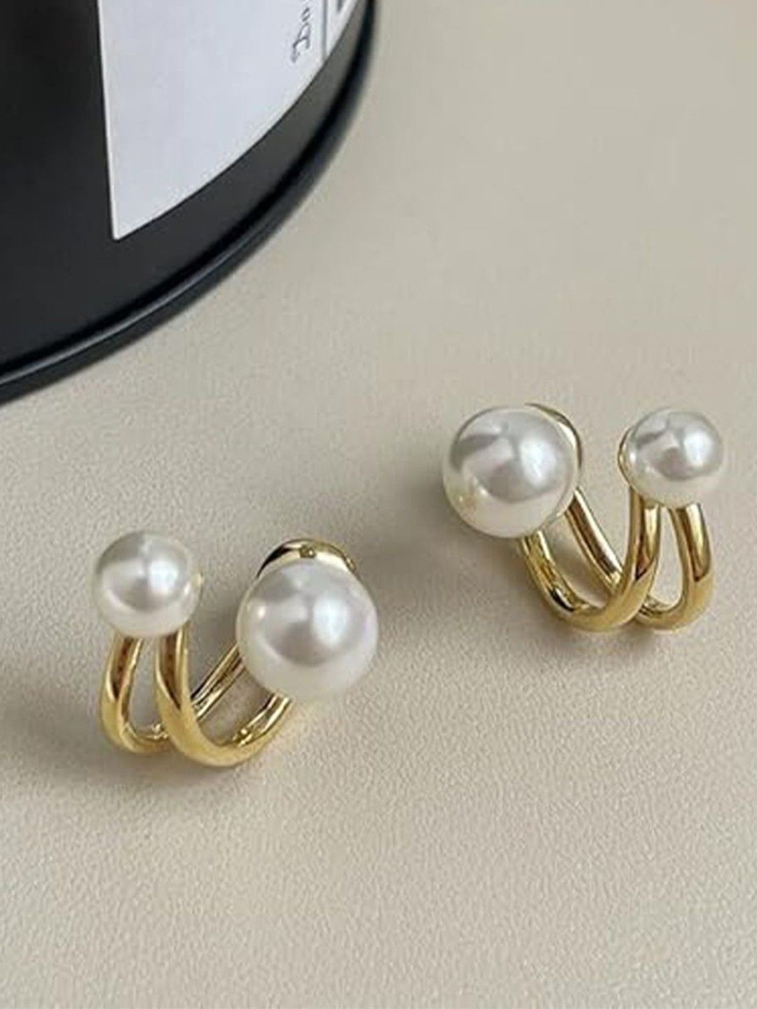 

CareDone Gold-Plated Pearls Studded Contemporary Shaped Studs