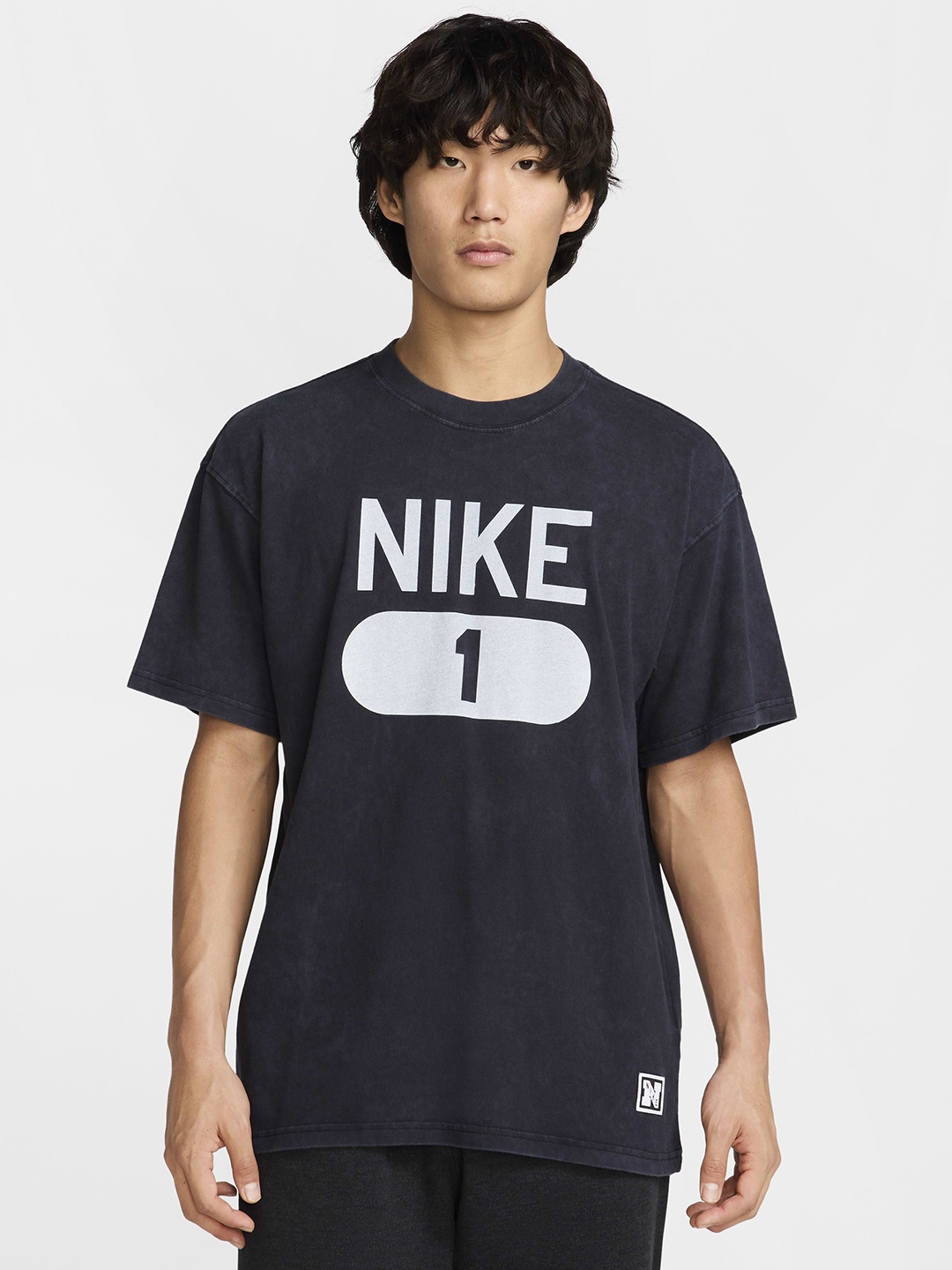

Nike Men Logo Printed Relaxed Fit Drop-Shoulder Sleeves Cotton Sport T-shirt, Black