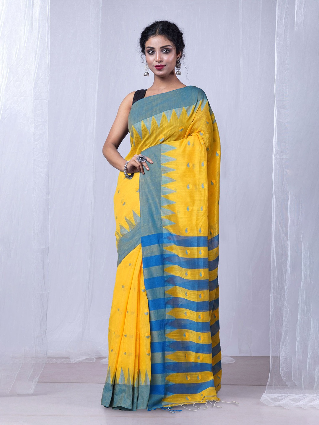 

Unnati Silks Woven Design Pure Linen Handloom Taant Saree, Yellow