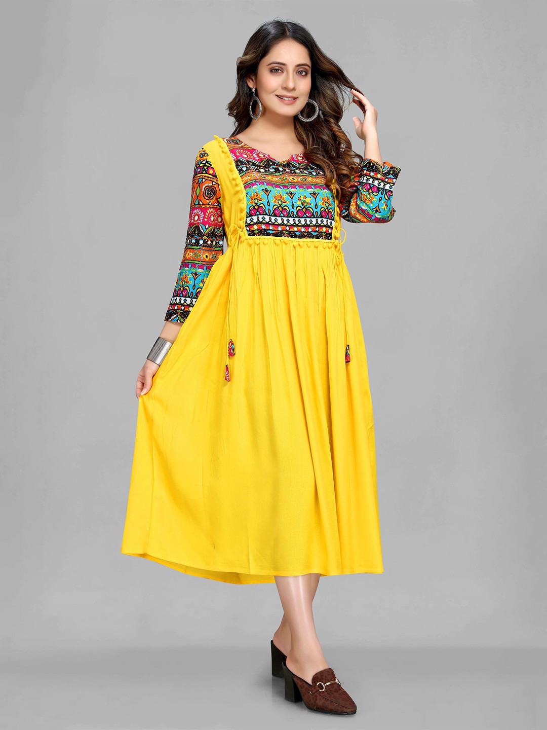 

Krimmple Women Printed Round Neck Kurta, Yellow