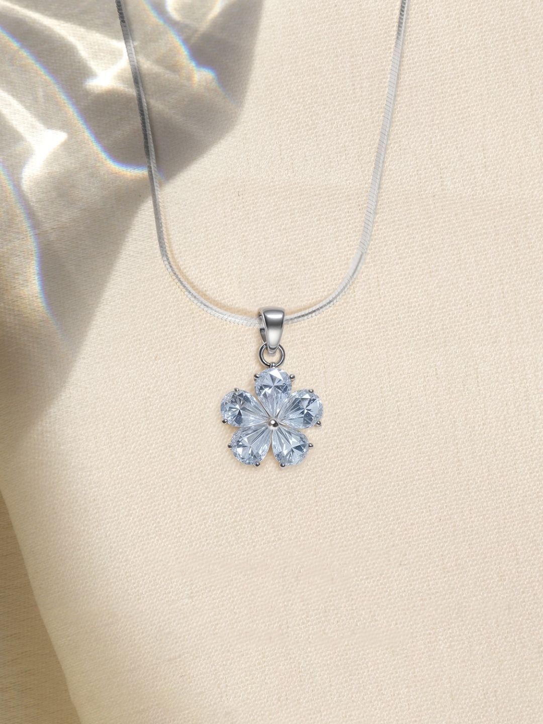 

HighSpark 92.5 Sterling Silver Cubic Zirconia Plumeria Flower Solitaire Pendant