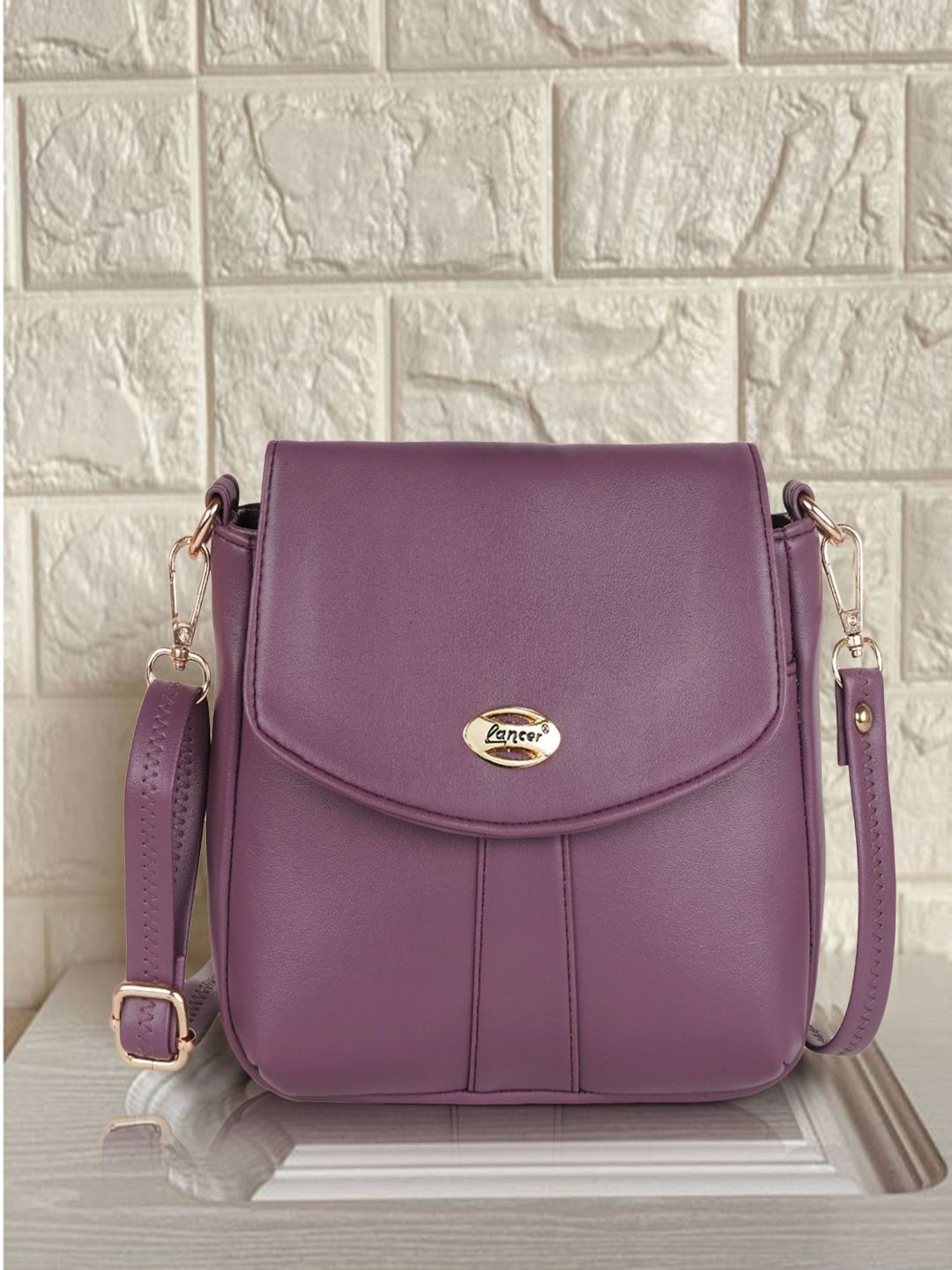 

Lancer Women Solid Structured Leather Sling Bag, Purple