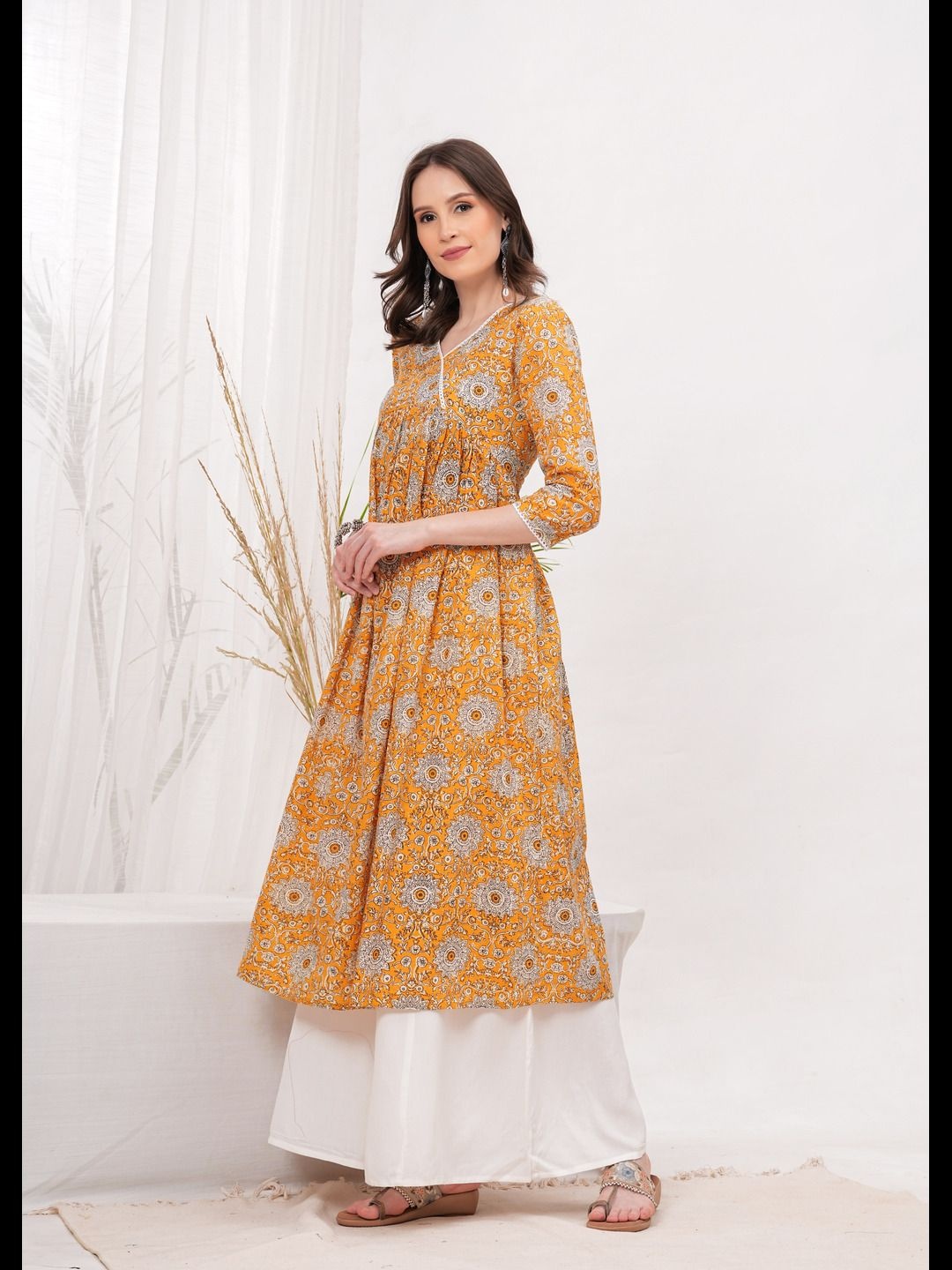 

Vilgi Floral Printed Pure Cotton Empire V-Neck A-Line Kurta With Palazzos, Mustard