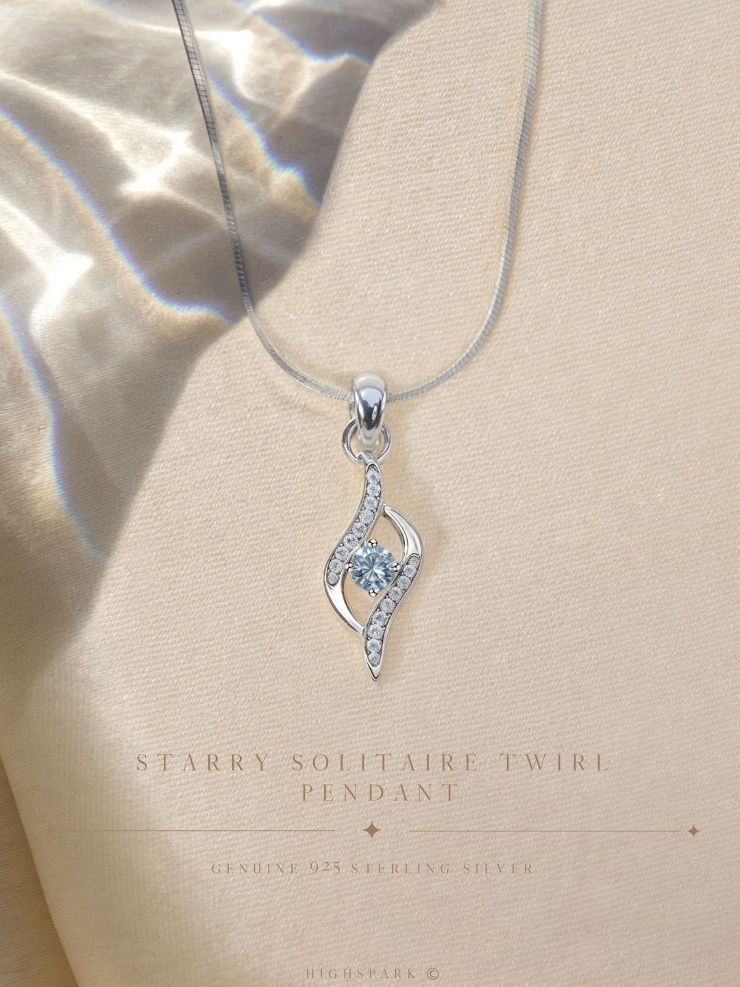 

HighSpark 92.5 Sterling Silver Cubic Zirconia Studded Dew Drop Solitaire Pendant