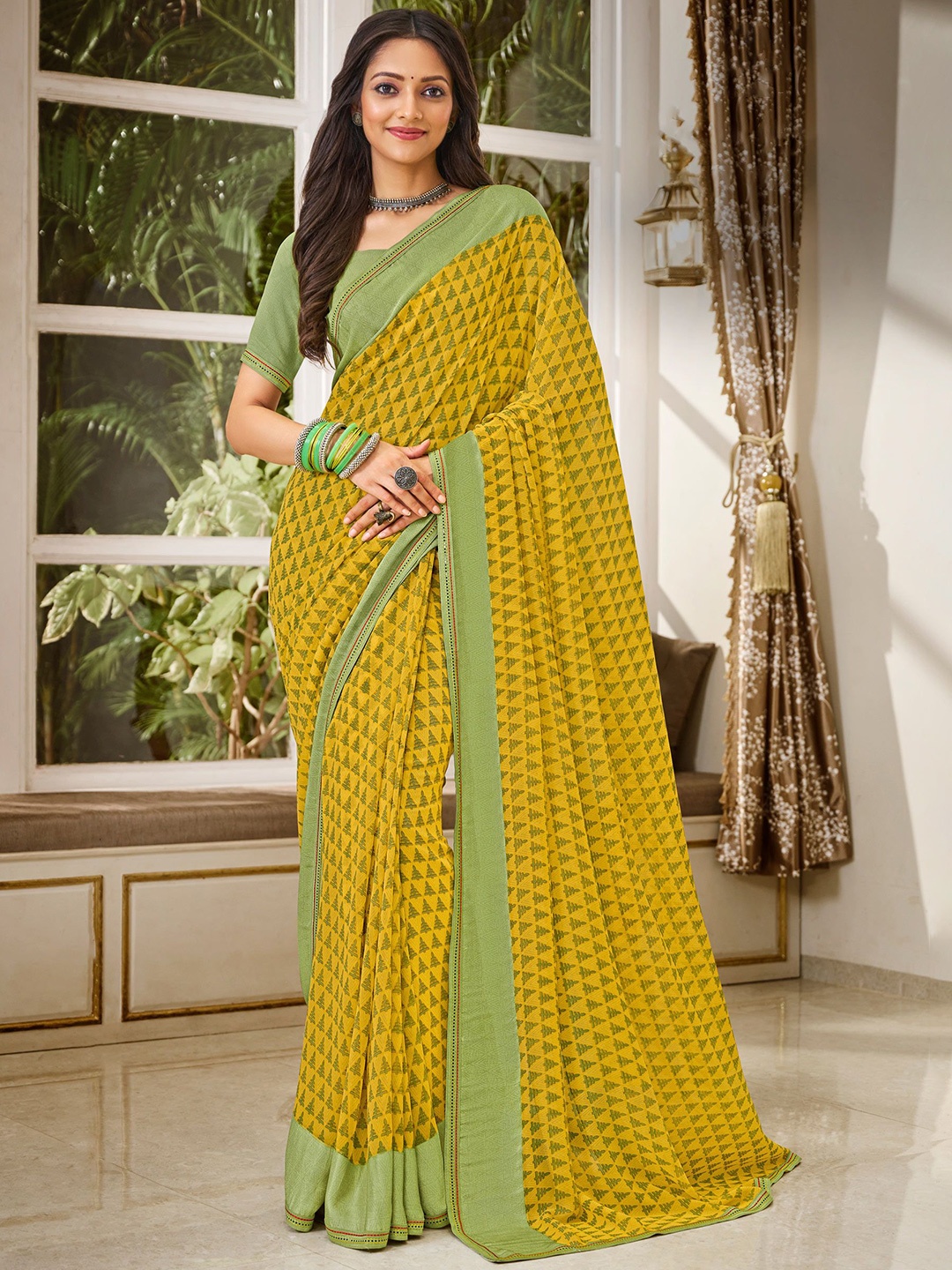 

Laxmipati Ethnic Motifs Printed Saree, Yellow