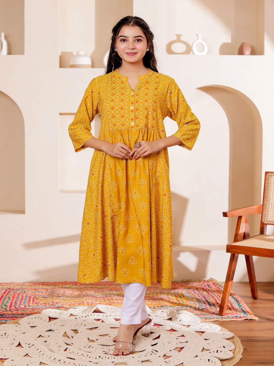 

Chandbaali Bandhani Printed Mandarin Collar A-Line Kurta, Yellow