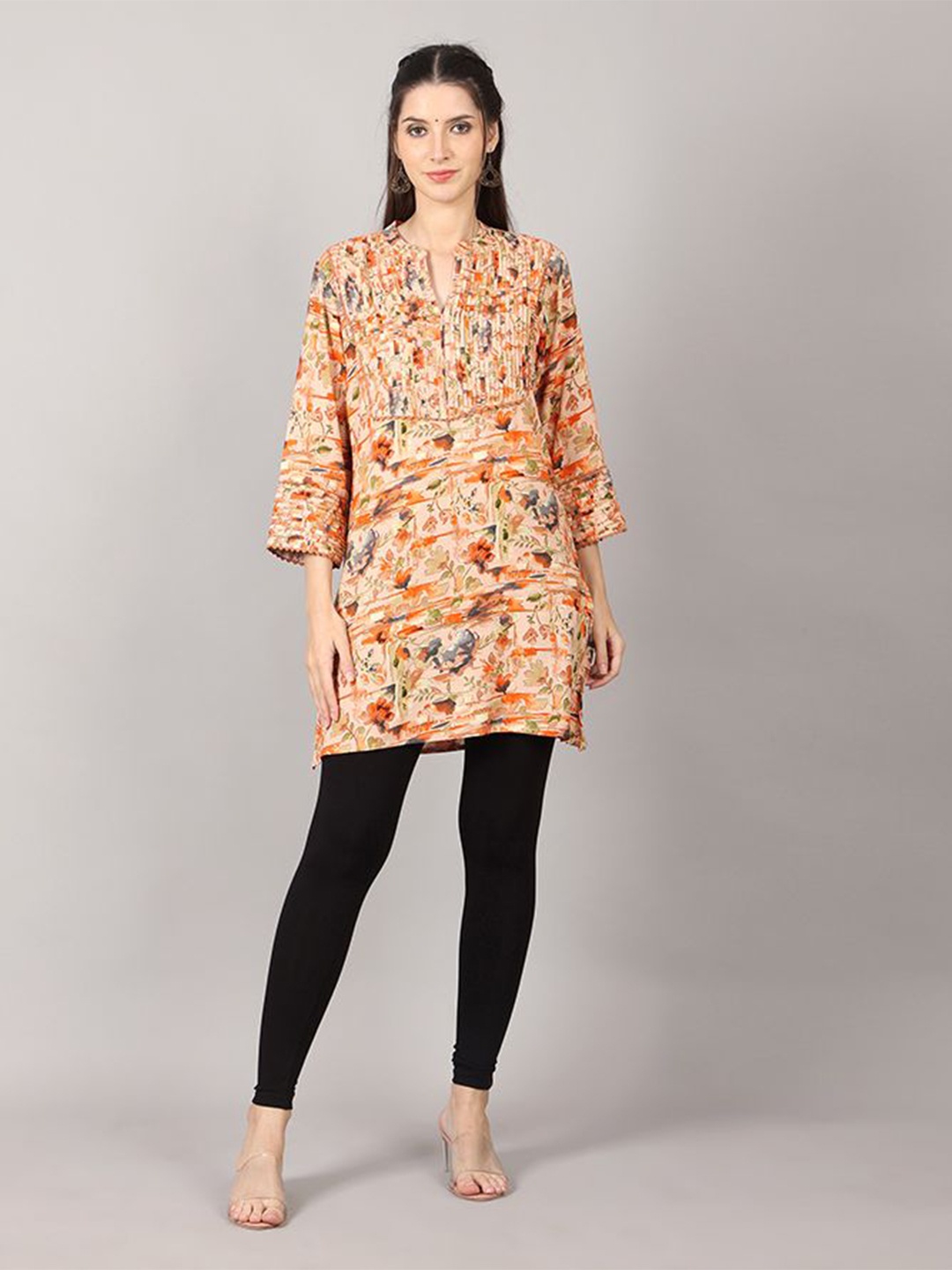 

Krimmple Women Floral Printed Gotta Patti Kurta, Orange