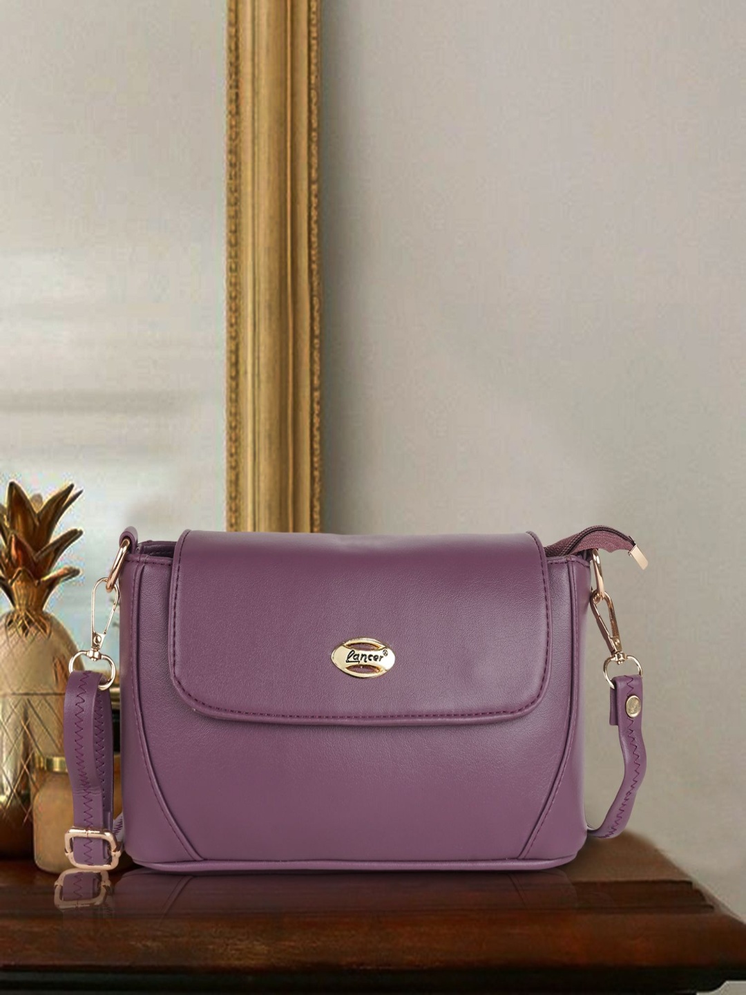 

Lancer Women Solid Structured Leather Sling Bag, Purple