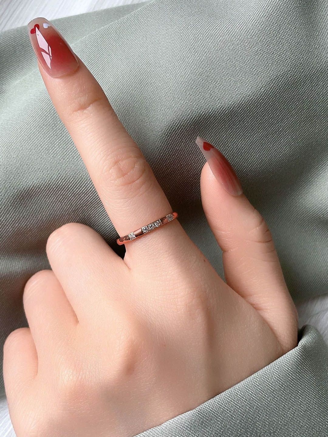 

StyleCast Gold-Toned Stone-Studded Elegant Finger Ring