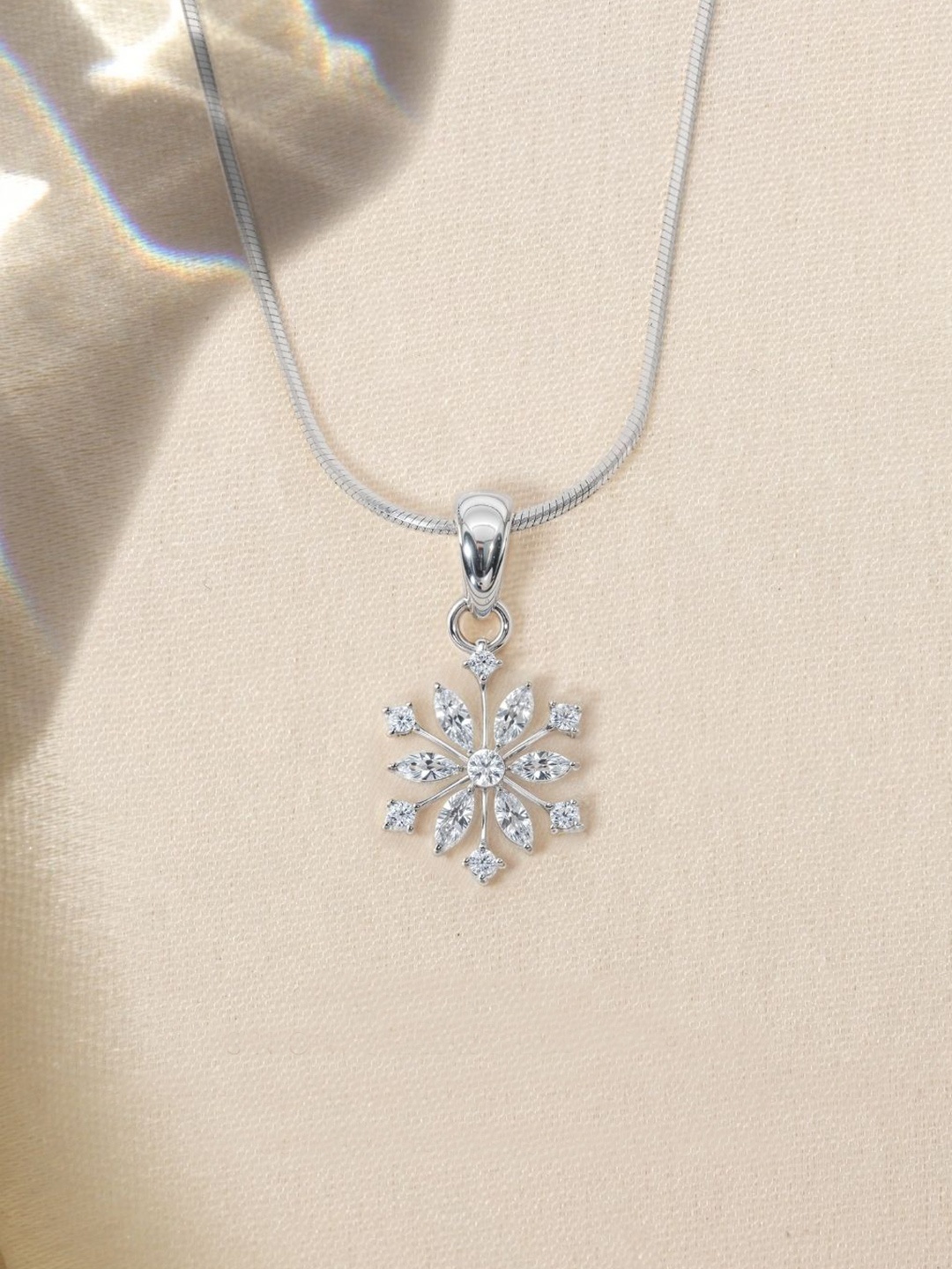 

HighSpark 92.5 Sterling Silver CZ Studded Classic Snowflake Solitaire Pendant
