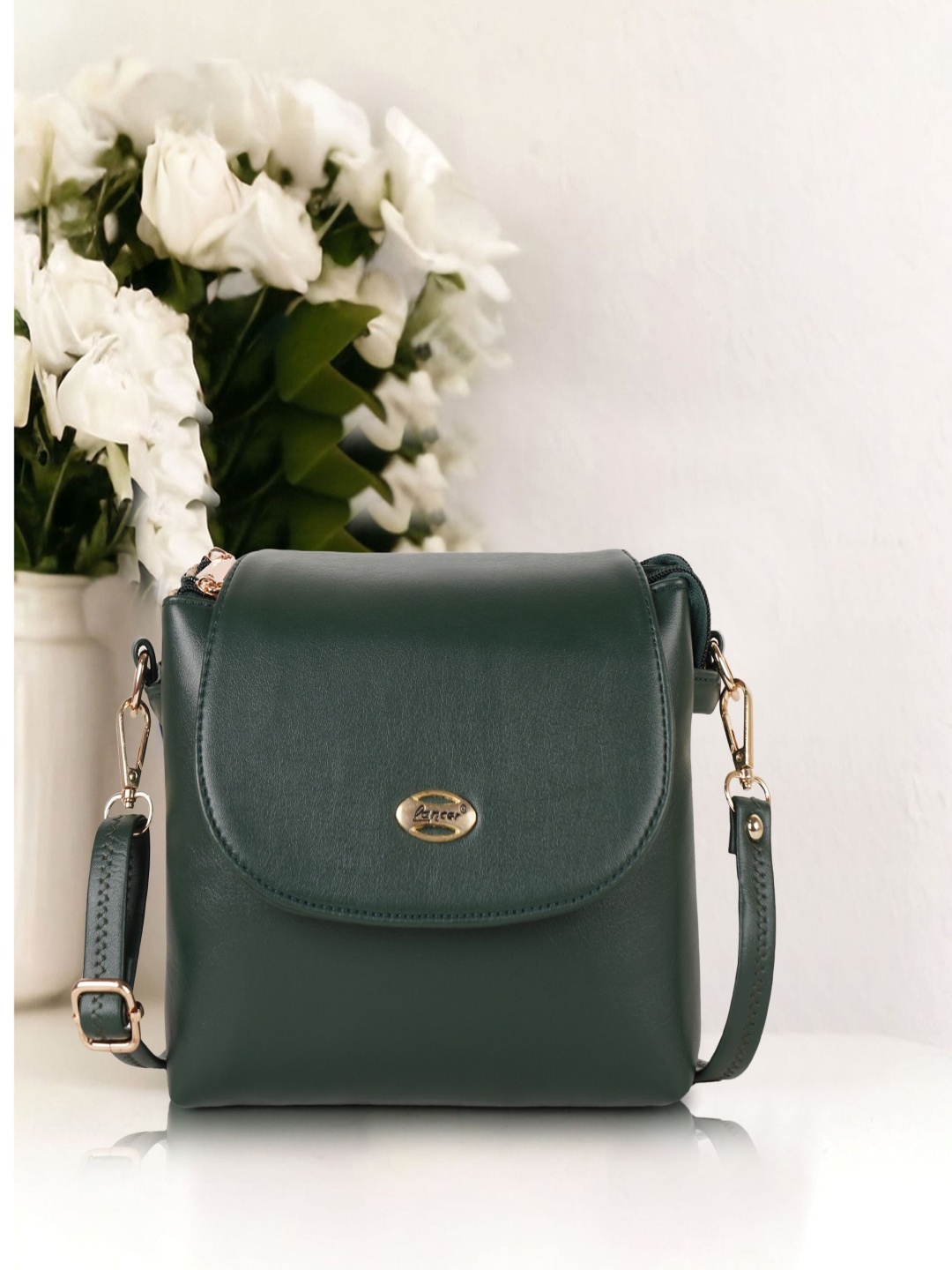 

Lancer Women Solid Structured Leather Sling Bag, Green